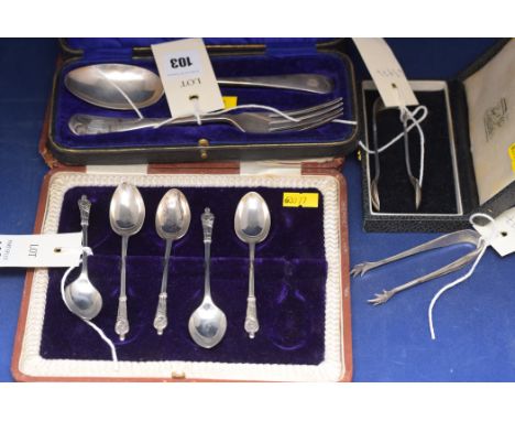 A George V silver christening set, by John Batt & Son Co. Ltd., Sheffield 1919, comprising: fork and spoon, in fitted case; a