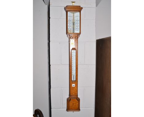 An early 20th Century stick barometer, by T.B. Winter & Sons, Newcastle on Tyne, in oak case.