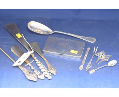 A white metal box (probably Persian); three silver handled shoe horns; a silver handled button hook; and other silver and pla