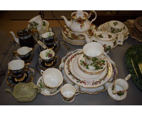A Hammersley & Co. bone china 'Strawberry Ripe' pattern part breakfast service; a Royal Albert 'Old Country Roses' pattern te
