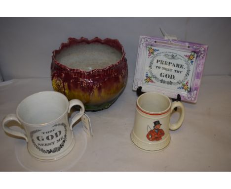 A North Eastern ceramic pink lustre plaque 'Prepare to meet thy God, in thee oh Lord do I put my trust...'; a North Eastern p