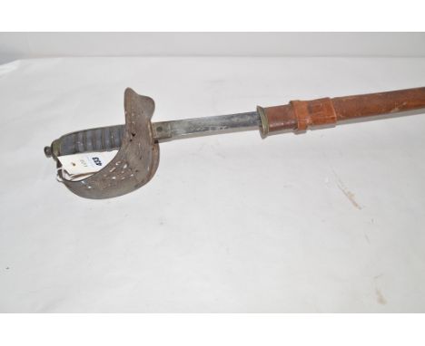 A Victorian infantry officer's sword with shagreen grip, in leather scabbard, 1897 pattern.