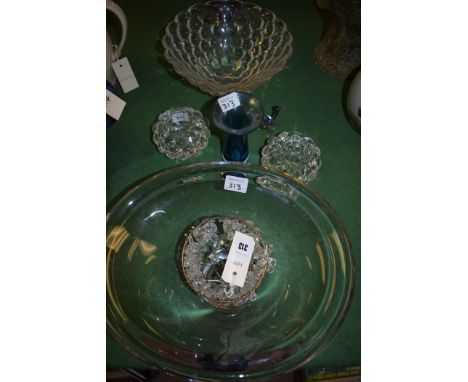 Orrefors bubble design vase, and matching candle holders; a Dartington clear glass bowl; Adrian Fanker blue flared rim vase; 