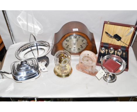 Silver-plated ware, to include: a tea pot, by Northern Goldsmiths Co; a bon-bon dish; a bread basket; a travelling clock; and