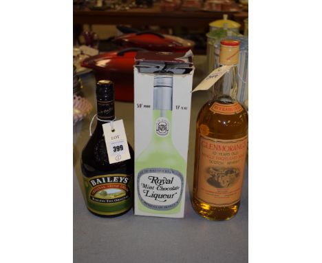 A bottle of Royal Mint Chocolate Liqueur; a bottle of Glenmorangie Single Highland Malt Scotch Whisky; and a bottle of Bailey
