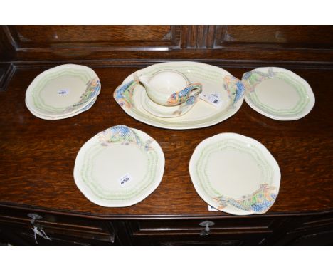 Clarice Cliff: a nine-piece part fish service, comprising: serving plate, sauce jug, six plates, and side plates, decorated w