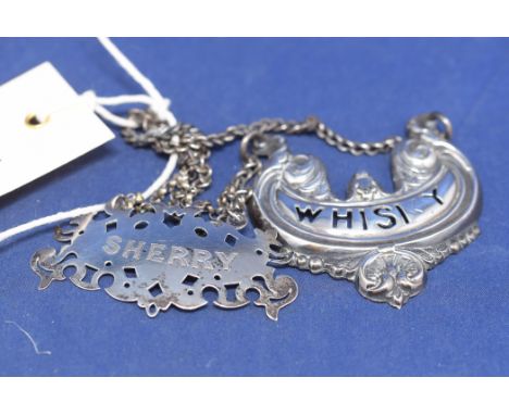 A Victorian decanter label, by Alfred Taylor, Birmingham 1853, 'Sherry'; and another.