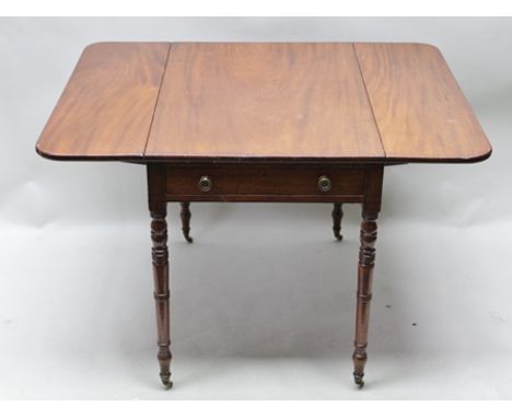 A 19TH CENTURY MAHOGANY PEMBROKE TABLE fitted single drawer, on ring turned legs terminating in ceramic castors, 71cm high 