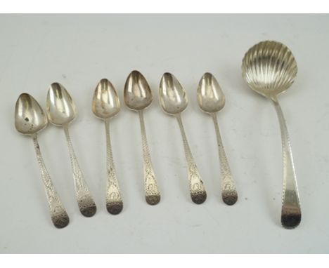 SIX BRIGHT CUT 18TH CENTURY SILVER SPOONS, 1783/1784, and an 18th century silver shell bowled SAUCE LADLE, 120g. 