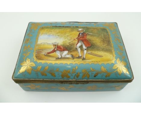 A CONTINENTAL CERAMIC TABLE BOX, hand painted to the hinged lid with an early golfing scene, a golfer and his caddy, jade gre