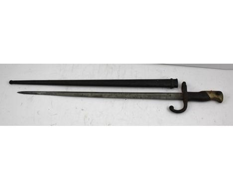 A FRENCH BAYONET dated 1876, serial no.14347 on scabbard and to cross piece 