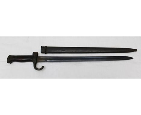 A FRENCH WORLD WAR I BAYONET WITH SCABBARD with wood grips, for use with M1892 and M1916 carbine made post 1912, stamped with