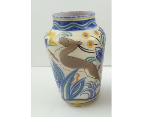 A "POOLE POTTERY" VASE, hand painted with leaping deer, amidst polychrome flowers, impressed and painted marks to base, purpl