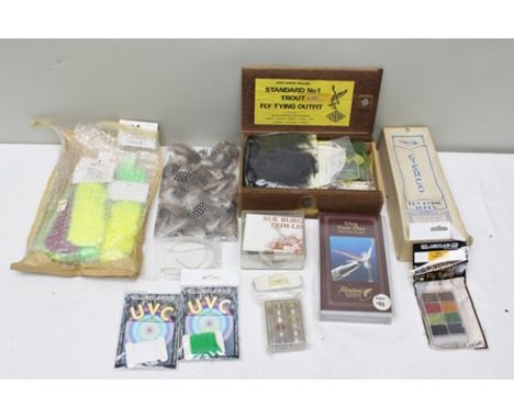A BOX OF FLY TYING EQUIPMENT including; Fishco Export fly tying tools ovb and various flies, together with tying trout flies 