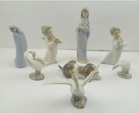 A COLLECTION OF LLADRO CERAMIC FIGURES includes; sleeping puppy, angel musicians etc. (8) 