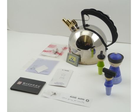 AN "ALESSI" WHISTLING KETTLE, together with a "Chin family" TIMER, and TWO BOTTLE STOPPERS, with accompanying paperwork 