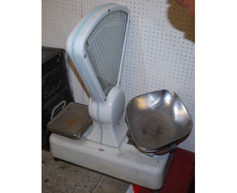 A pair of mid 20th century cast iron weighing scales, by Asko Ltd of Broadheath, Manchester