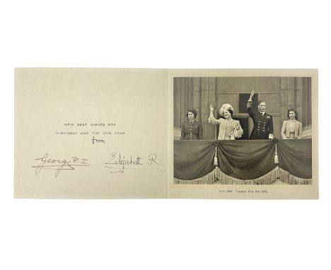 King George VI and Queen Elizabeth - signed 1945 Christmas card with gilt embossed crown to cover, black and white photograph