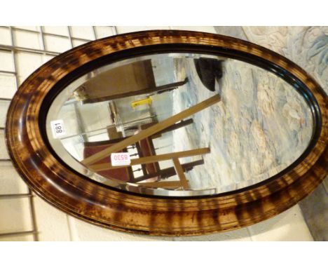 Vintage oval bevelled edge mirror. Dia: 82 cm 