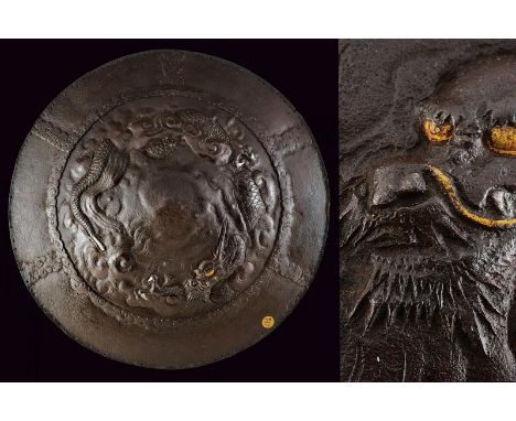 dating: Period (1603-1867) provenance: Japan, Made of iron, of round and convex shape, consisting of two riveted parts, majes
