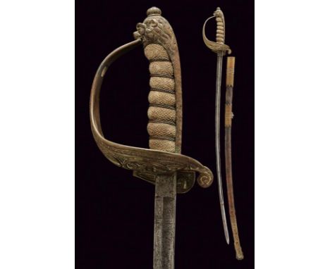 dating: circa 1900 provenance: Italy, Curved, single-and-false-edged blade, engraved on both sides. Brass hilt with anchor in