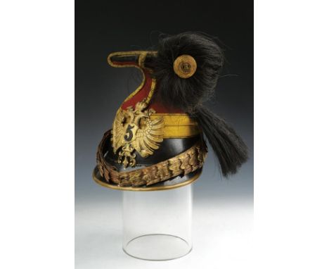 dating: Late 19th Century provenance: Austria, Blackened leather skull, partially covered with a red cloth with rope-making a