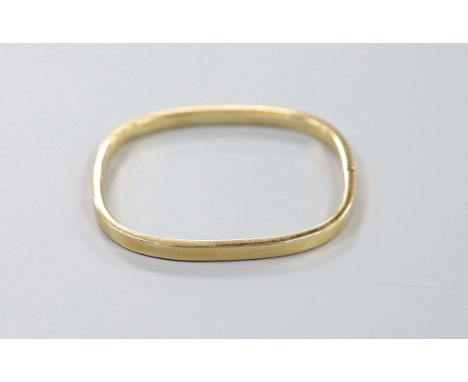 A 9ct gold bangle, interior diameter 59mm, 10 grams.