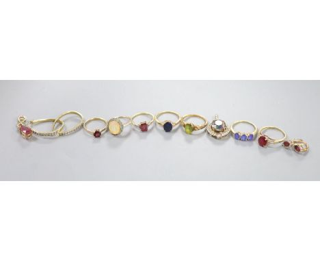 Six assorted modern 9ct gold and gem set dress rings, a pair of 9ct and gem set earrings and two 9ct gold and gem set pendant