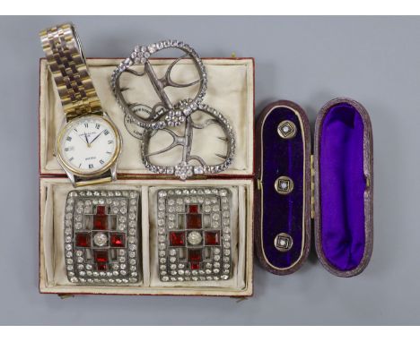 A pair of steel and paste set shoe buckles, one other pair, a cased set of three opal set dress studs and a Pulsar watch.