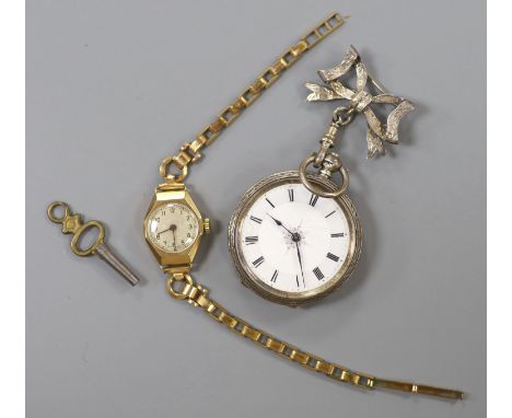 A lady's yellow metal manual wind wrist watch, on a gold plated bracelet, together with a silver fob watch.