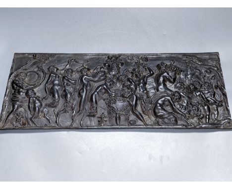 A 19th century cast bronze Bacchanalian plaque, 47 cms wide x20 high.