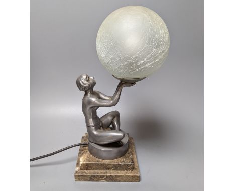 An Art Deco style ‘seated female’ lamp with spherical shade and marble base. 37cm