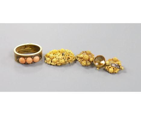 An Edwardian yellow metal, coral and diamond chip set scarf clip, 22mm and two yellow metal filigree items, gross 14.4 grams.