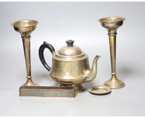 A 1930's silver teapot, a pair of silver mounted posy vases(a.f.), an Egyptian white metal small dish and a metal trough, wei