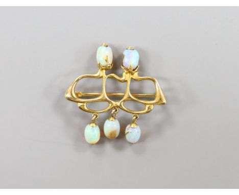 A stylish Art Nouveau yellow metal and five stone opal set brooch(a.f.), 31mm, gross weight 4.8 grams.