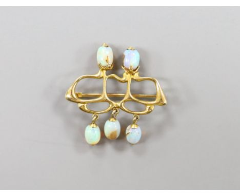 A stylish Art Nouveau yellow metal and five stone opal set brooch(a.f.), 31mm, gross weight 4.8 grams.