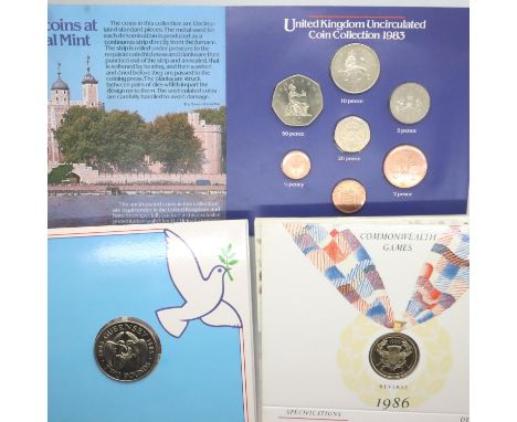 1985 and 1986 Royal Mint two pounds commemorative coins in sleeves and a 1983 Royal Mint uncirculated coin collection (3). P&