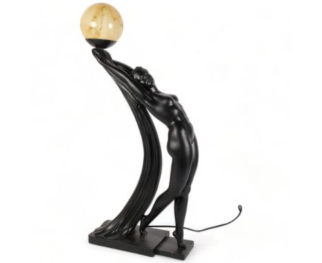 A large and impressive Art Deco style table lamp, a reclining nude lady, with associated marble effect glass shade, H87cm, st