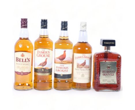 3 bottles of Famous Grouse Scotch Whisky, Bell's Whisky and a bottle of Amaretto 