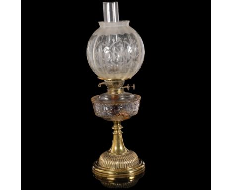 A Victorian brass oil lamp, etched glass shade with clear glass font, H56cmGood overall condition, a few minor chips to the e