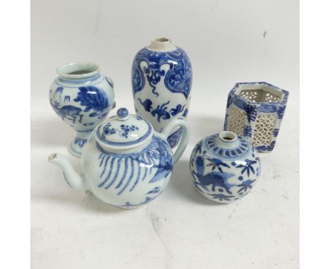 A selection of modern blue and white Chinese ceramic items, including a hexagonal reticulated vase, H8cm, various blue and wh