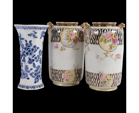 A pair of hand painted Japanese vases, lovely gilded decoration with various hand painted rose bush sections, both marked to 
