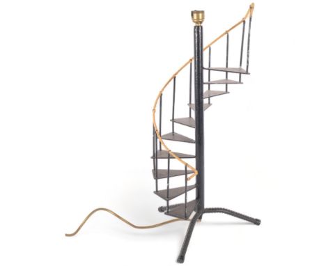 A table lamp modelled as a spiral staircase with metal treads, h56.5cm 