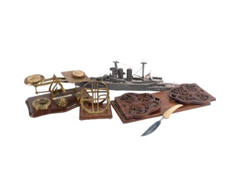 Antique brass postal scale and weights on stand, a carved mahogany table-top extending bookrack, a brass and mahogany Art Nou