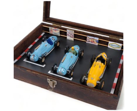 A table-top display case, containing 3  “Merit”  plastic 1:24 scale model Talbot-Lago Grand Prix racing cars, display case me