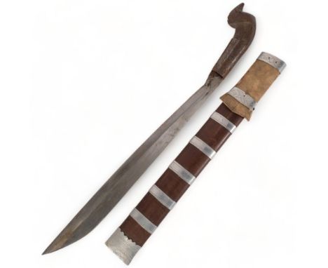 A Philippine machete/jungle knife, blade length 41.5cm, overall length 55.5cm 