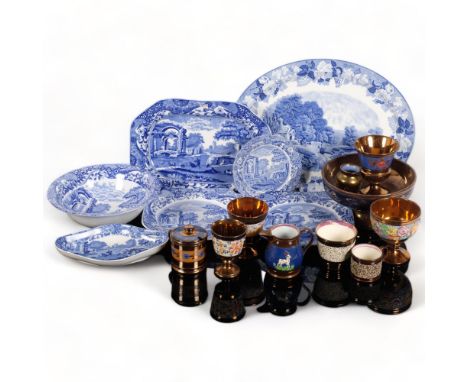 A selection of copper lustre ware, including various goblets, centrepiece bowls, etc, and a selection of blue and white ceram