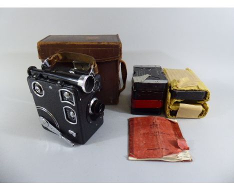 A Leather Cased Siemens Clockwork 16mm Cine Camera with Original Instruction Booklet and Seven Film Spools