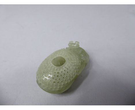 A Pretty Oriental Jade Brush Holder, Carved as a Fantailed Fish Next to Lilly Pad.