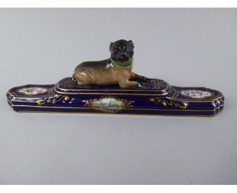 A 19th Century Dresden Porcelain Study of a Recumbent Pug Dog on Cobalt Blue and Gilt Plinth Decorated with Flowers. (One Paw